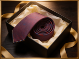 The Belgravia Textured Grenadine Tie rolled in a gift box, close detail of the silk weave