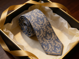 Royal Damask Tie rolled in a gift box, close detail of the silk weave